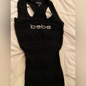 Size small Bebe black racerback sweater tank top with rhinestone Bebe logo